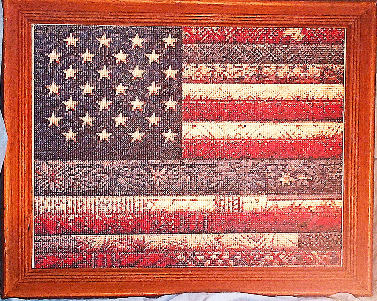 Imagine book spines stacked in a way to form an American Flag.  Add a few sparkling stars on a blue background and open your eyes, your dream is reality.  17" x 21", framed in a solid wood frame and ready to grace your wall for years to come.