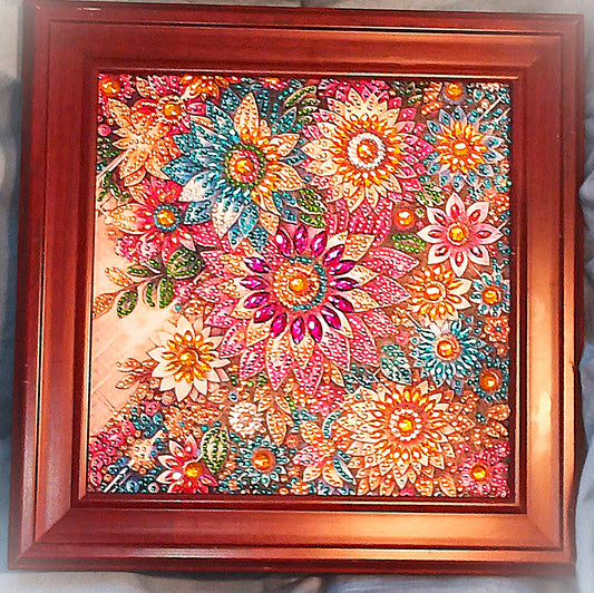 Artwork with colorful floral patterns in vibrant colors.  Beautiful solid wood frame surrounds the piece.